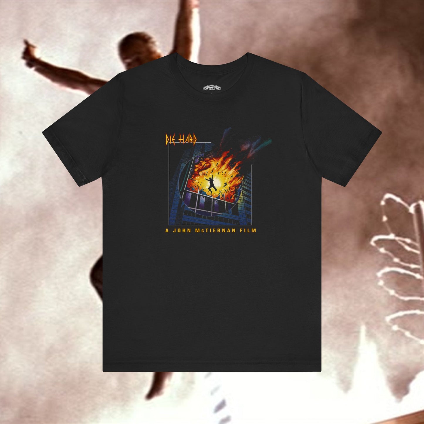 Die Hard meets Def Lep's Pyromania mash up film and music T‑Shirt
