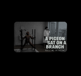 A Pigeon Sat on a Branch Reflecting on Existence Roy Andersson T-Shirt