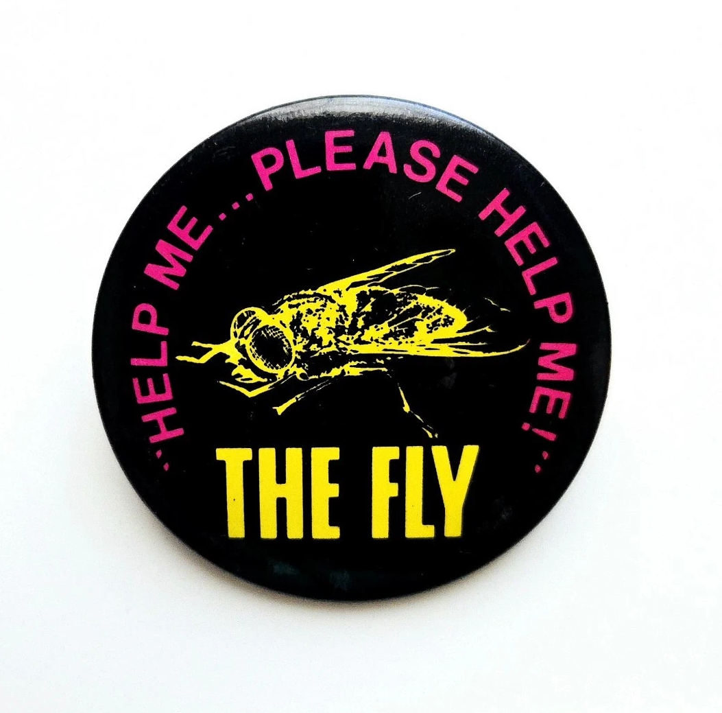 The Fly 'Help Me Please Help Me' promotional pin for the film - fathful reproductiond from the original