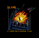 Die Hard meets Def Lep's Pyromania mash up film and music T‑Shirt